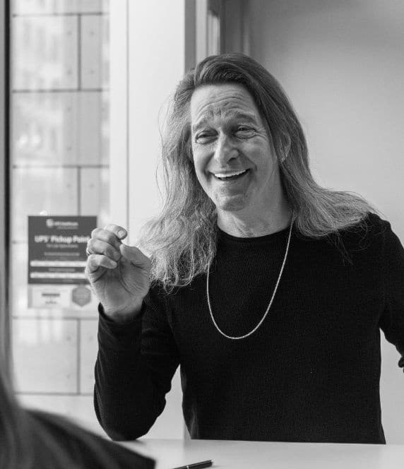 Modern smiles action shots b&w (3) Patient smiling at office staff