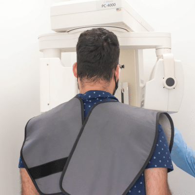 Benefits of dental x‑rays 5 Patient undergoing dental x-ray procedure at modern smiles dentistry, representing the benefits of dental x‑rays